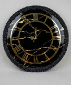 Black and gold resin clock